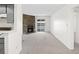 Living room with a fireplace and sliding door to balcony at 1980 S Xanadu Way # 208, Aurora, CO 80014
