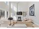 Bright and airy living room featuring a vaulted ceiling and modern décor at 31699 Southern Hills Pl, Evergreen, CO 80439