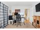 Home office featuring a standing desk and built-in shelving at 1400 Bacchus Dr # C11, Lafayette, CO 80026