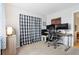 Bright home office with a large desk and window at 1400 Bacchus Dr # C11, Lafayette, CO 80026