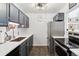 Updated kitchen featuring dark cabinets, stainless steel appliances, and a stylish backsplash at 1400 Bacchus Dr # C11, Lafayette, CO 80026