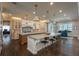 Elegant kitchen featuring a spacious island, bar seating, and mountain views at 10805 Evergold Way, Highlands Ranch, CO 80126