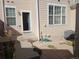 Small patio with access to the back of the house at 8436 E 35Th Ave, Denver, CO 80238