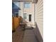 Small, private backyard with a patio and wooden fence at 8436 E 35Th Ave, Denver, CO 80238