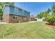Spacious backyard featuring a well-manicured lawn and a concrete patio at 2122 S Zephyr St, Lakewood, CO 80227