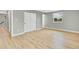 Bedroom with ample closet space, hardwood floors, neutral walls and natural light at 2122 S Zephyr St, Lakewood, CO 80227