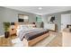 Main bedroom with neutral decor, wood flooring and stylish decor at 2122 S Zephyr St, Lakewood, CO 80227
