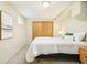 Cozy bedroom with a comfortable bed, a closet, and a window for natural light at 2849 E Cresthill Ave, Centennial, CO 80121