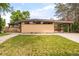 Charming single-story home with a well-manicured lawn, inviting curb appeal, and a covered carport at 2849 E Cresthill Ave, Centennial, CO 80121