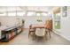 Bright living room features a dining area, large windows, and contemporary finishes, great for relaxing at 2849 E Cresthill Ave, Centennial, CO 80121