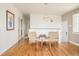 Spacious living room featuring hardwood floors, neutral paint, and a stylish sitting area at 2849 E Cresthill Ave, Centennial, CO 80121