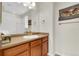 Well-lit bathroom with a stylish vanity, modern fixtures, and neutral wall colors at 12831 King St, Broomfield, CO 80020