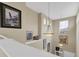 High ceiling foyer with art and windows at 12831 King St, Broomfield, CO 80020