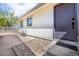 Charming entrance with a neutral-toned front door and inviting stone landscaping at 6338 W 92Nd Pl, Westminster, CO 80031