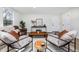 Elegant living room with modern decor, comfortable seating, and a welcoming ambiance at 6338 W 92Nd Pl, Westminster, CO 80031