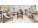 Cozy living area with hardwood floors, stylish furnishings, and a dining area at 6338 W 92Nd Pl, Westminster, CO 80031