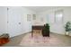 Charming home office space featuring a stylish desk and a decorative rug at 6338 W 92Nd Pl, Westminster, CO 80031