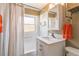 Clean bathroom, featuring a shower/tub combo and updated vanity at 3825 W 73Rd Ave, Westminster, CO 80030