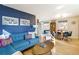 Open concept dining area with a mid-century modern table and chairs at 3825 W 73Rd Ave, Westminster, CO 80030