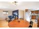 Open concept dining area with kitchen views and hardwood floors at 3825 W 73Rd Ave, Westminster, CO 80030