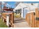 Cute bungalow with a deck, gate, and inviting front entrance at 3825 W 73Rd Ave, Westminster, CO 80030