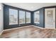 Bright dining room features modern design, natural light and views from the windows at 5128 Preserve Pl, Firestone, CO 80504