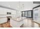 Kitchen features a granite island and stainless steel appliances for modern cooking at 5128 Preserve Pl, Firestone, CO 80504