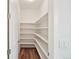 Pantry with lots of open shelving for storing food and other items at 5128 Preserve Pl, Firestone, CO 80504