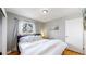Bedroom with large bed and bright window at 1852 S Forest St, Denver, CO 80222