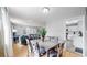 Open dining area connected to living room and kitchen, perfect for modern living and entertaining at 1852 S Forest St, Denver, CO 80222