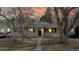 Charming one-story home with mature trees and a cozy front porch perfect for relaxing at 1852 S Forest St, Denver, CO 80222