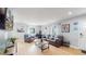 Inviting living room with a comfortable seating area and ample natural light from large windows at 1852 S Forest St, Denver, CO 80222