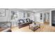 Cozy living room showcasing hardwood floors, stylish furniture, and plenty of natural light at 1852 S Forest St, Denver, CO 80222