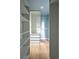 Walk-in closet with custom shelving, drawers, and organizers, providing ample storage at 654 S Shoshone St, Denver, CO 80223