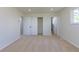 Spacious carpeted bedroom with closet and bathroom access; bright and airy with neutral tones and clean design at 3256 S Nucla St, Aurora, CO 80013