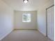 A bright bedroom includes carpet, a window and closet for storage at 3256 S Nucla St, Aurora, CO 80013