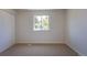 Bedroom features carpeted flooring, a window for natural light and a closet at 3256 S Nucla St, Aurora, CO 80013