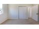 A bright bedroom includes carpet, a window and closet for storage at 3256 S Nucla St, Aurora, CO 80013