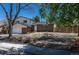 Two-story home with a brick-and-siding facade, a two-car garage, and a partially landscaped front yard at 3256 S Nucla St, Aurora, CO 80013
