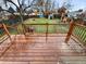A perfect backyard with a wooden deck, play set and a shed, ready for enjoyment and outdoor activities at 1045 Mobile St, Aurora, CO 80011