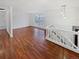 Inviting living room with hardwood floors and plenty of natural light, ideal for relaxing or entertaining guests at 1045 Mobile St, Aurora, CO 80011