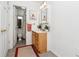 Clean bathroom featuring a vanity, toilet and shower/tub at 855 N Pennsylvania St # 407, Denver, CO 80203