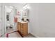 Bright bathroom with vanity, toilet and shower/tub combo at 855 N Pennsylvania St # 407, Denver, CO 80203