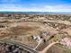 Picturesque rural property showcases rolling terrain, distant mountain views, and a charming home at 595 W Oak Hill Ln, Castle Rock, CO 80108