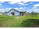Well-maintained barn with ample space, perfect for horses or livestock, set on a sprawling green field at 595 W Oak Hill Ln, Castle Rock, CO 80108