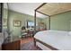 A beautiful bedroom with wood floors, lots of light and views of pastures at 595 W Oak Hill Ln, Castle Rock, CO 80108