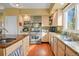 Well-equipped kitchen featuring stainless steel appliances and an island at 595 W Oak Hill Ln, Castle Rock, CO 80108