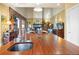 Well-equipped kitchen featuring a sink and view to the living room at 595 W Oak Hill Ln, Castle Rock, CO 80108