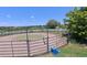Outdoor horse riding arena enclosed by metal gates, offering a space for training and exercise at 595 W Oak Hill Ln, Castle Rock, CO 80108