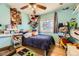 Bright bedroom with vibrant colors, plush bedding, and a large window, perfect for a  at 1756 S Memphis St, Aurora, CO 80017